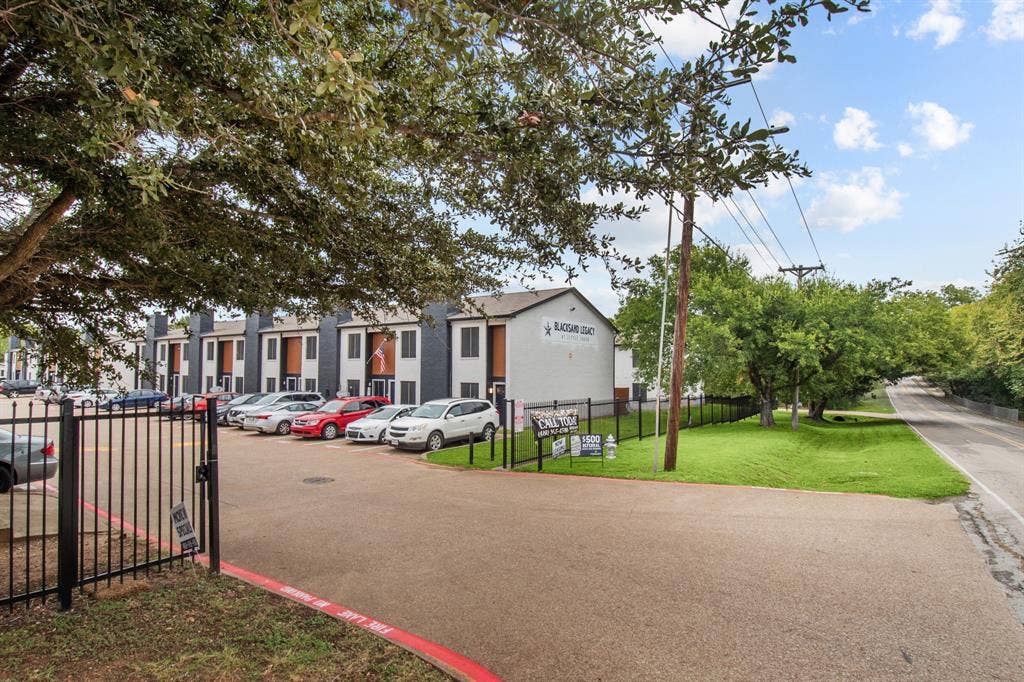 151 E Little Creek Road, #D-06, Cedar Hill, TX 75104 Little Creek community entrance. Community view, not the interior of unit D-06.