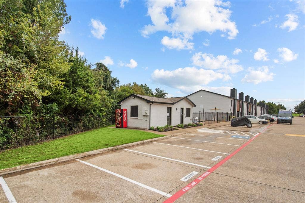 Little Creek community exterior and parking. Community view, not the interior of unit F-04.