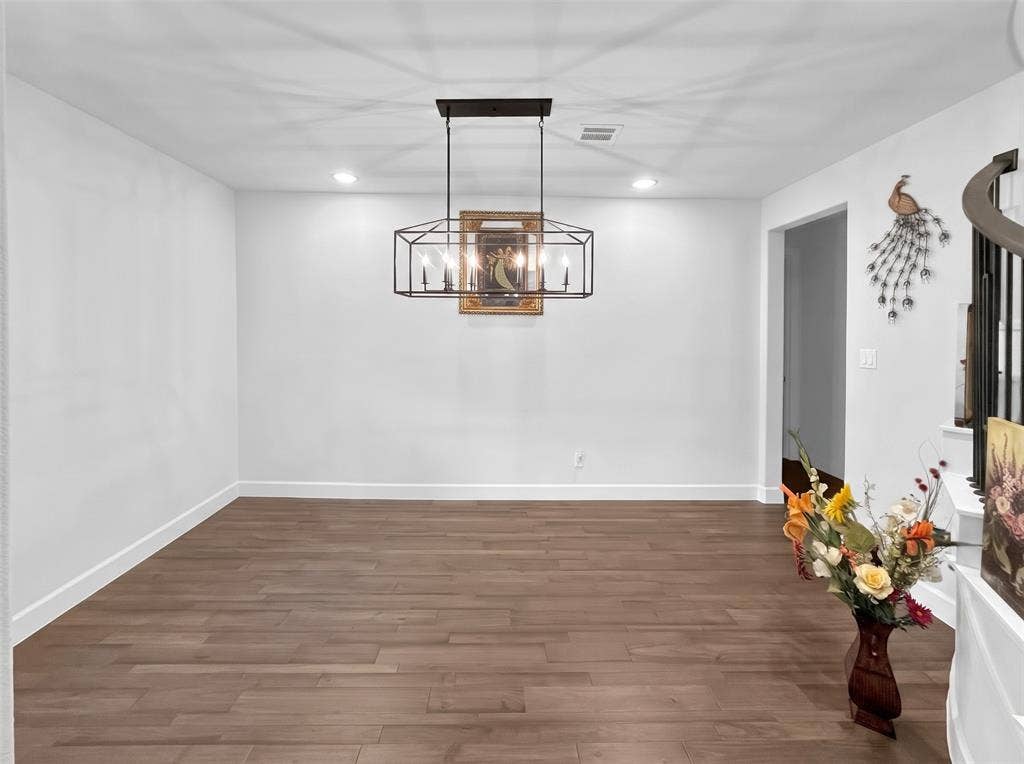 2251 Macy Way, Prosper, TX 75078 Geometric metal chandelier with six candelabra-style bulbs, wood-finish flooring, and recessed ceiling lighting