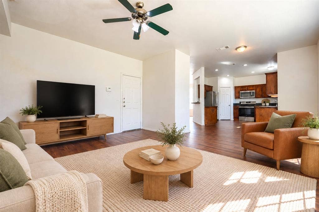 2709 Maci Court, Seagoville, TX 75159 Living area featuring wood-finish flooring, a ceiling fan with integrated lighting, and recessed ceiling lighting