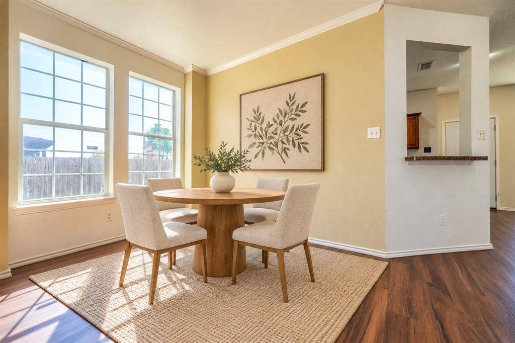 2709 Maci Court, Seagoville, TX 75159 Wood-finish flooring, dual grid-pane windows, and a pass-through opening with a ledge