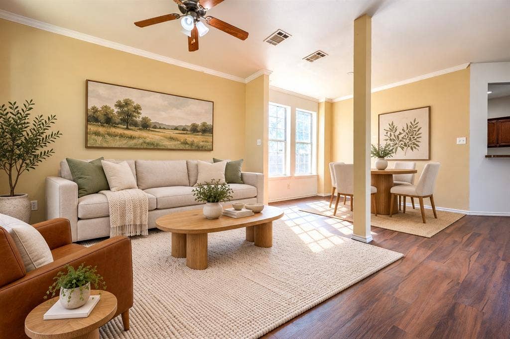 2709 Maci Court, Seagoville, TX 75159 Living space featuring wood-finish flooring, neutral wall paint, and a ceiling-mounted fan with integrated lighting