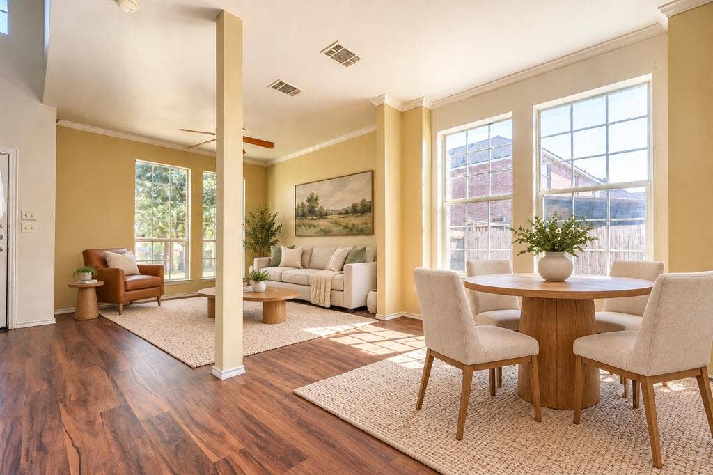 2709 Maci Court, Seagoville, TX 75159 Open-concept floor plan featuring wood-finish flooring, multi-pane windows, and crown molding