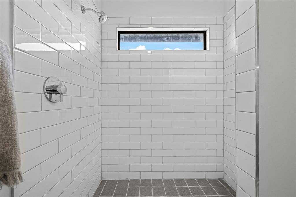 A walk-in shower completes the guesthouse’s private full bath.