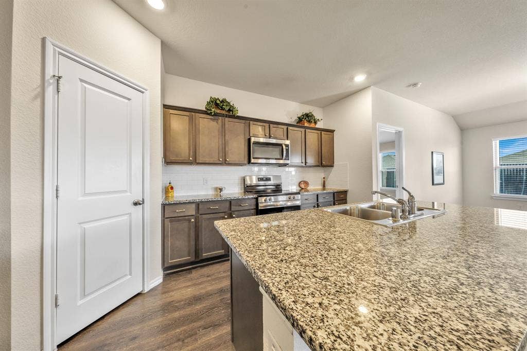 1996 Ocelot Street, Crandall, TX 75114 Stainless appliances - stove was replaced in October, 2026