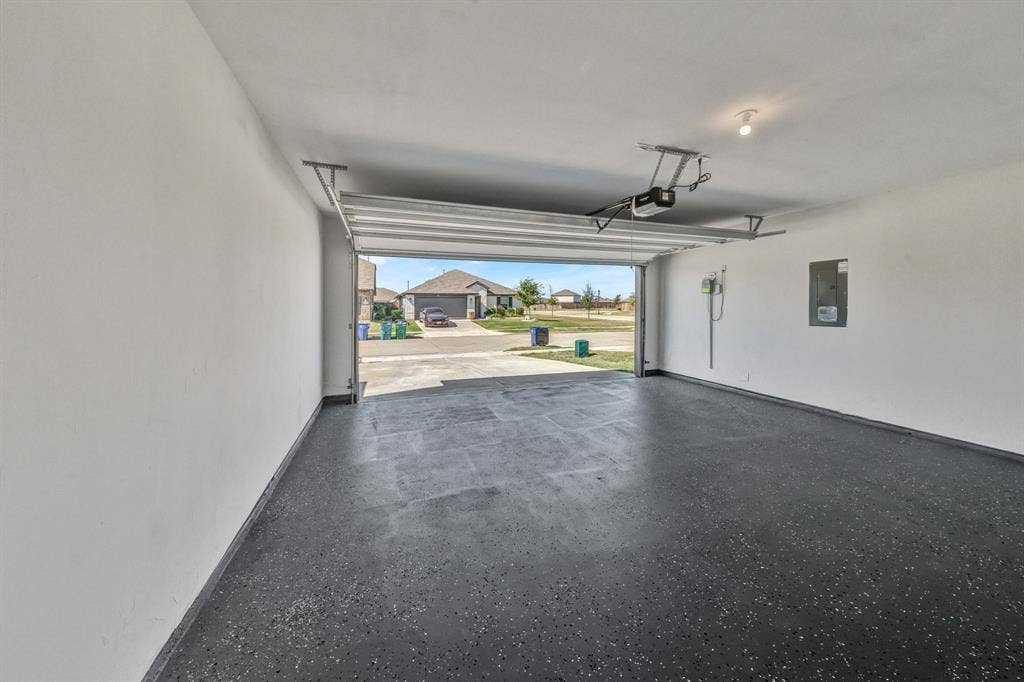 1996 Ocelot Street, Crandall, TX 75114 Garage - epoxy recently coated onto the floor