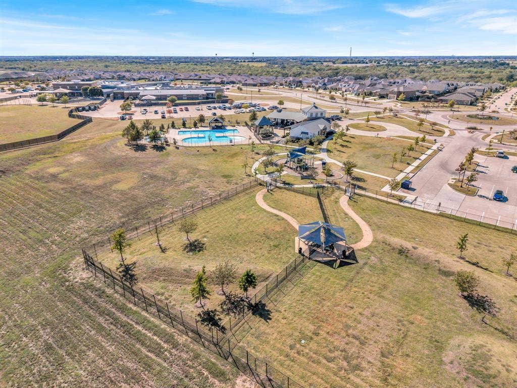 1996 Ocelot Street, Crandall, TX 75114 Elementary School is shown at the top of this photo, on the other side of the community center.