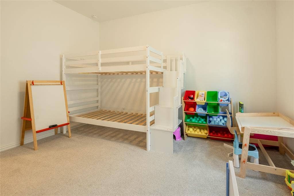 Room featuring neutral wall tones and neutral carpeting
