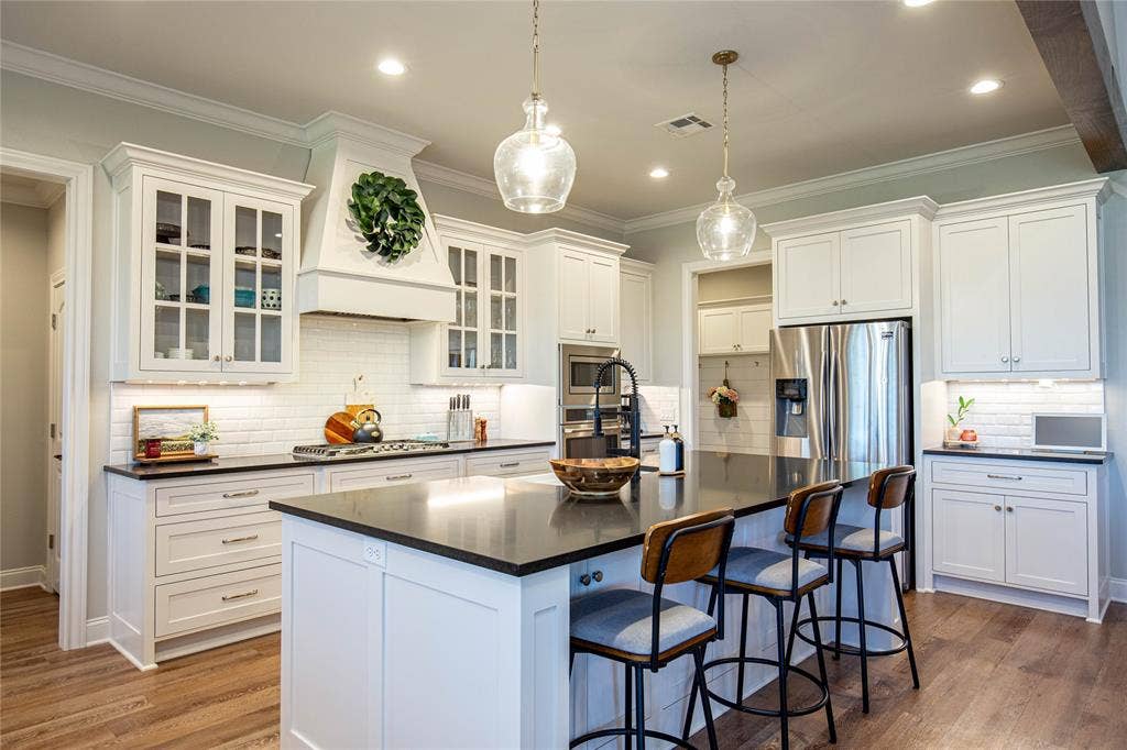 large kitchen includes a large walk-in pantry.
