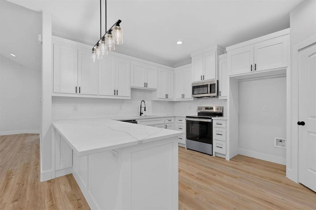 1309 N BRECKENRIDGE Street, Ennis, TX 75119