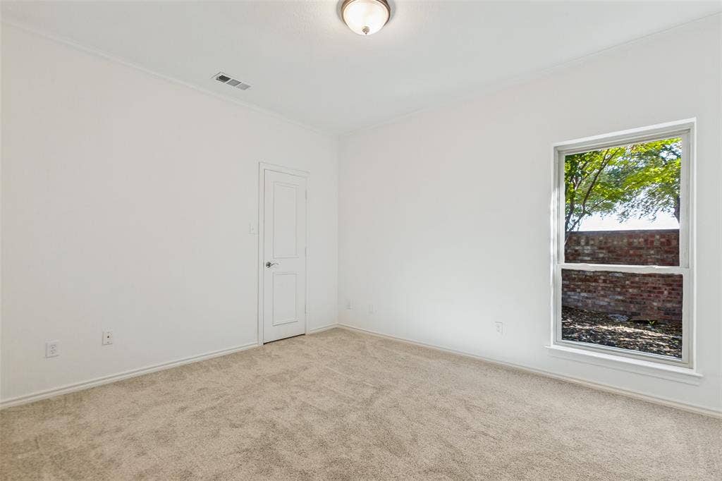 This bedroom is at the north end of the home with a full bath across the hall