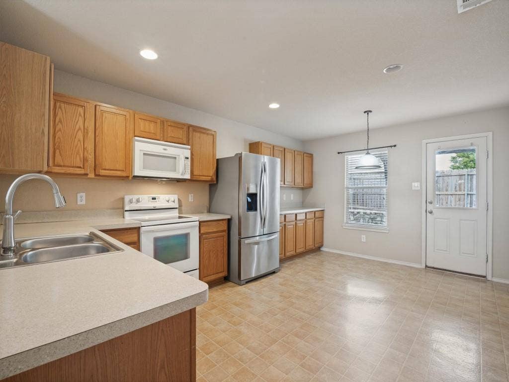 Eat- in breakfast area and direct access to the backyard.