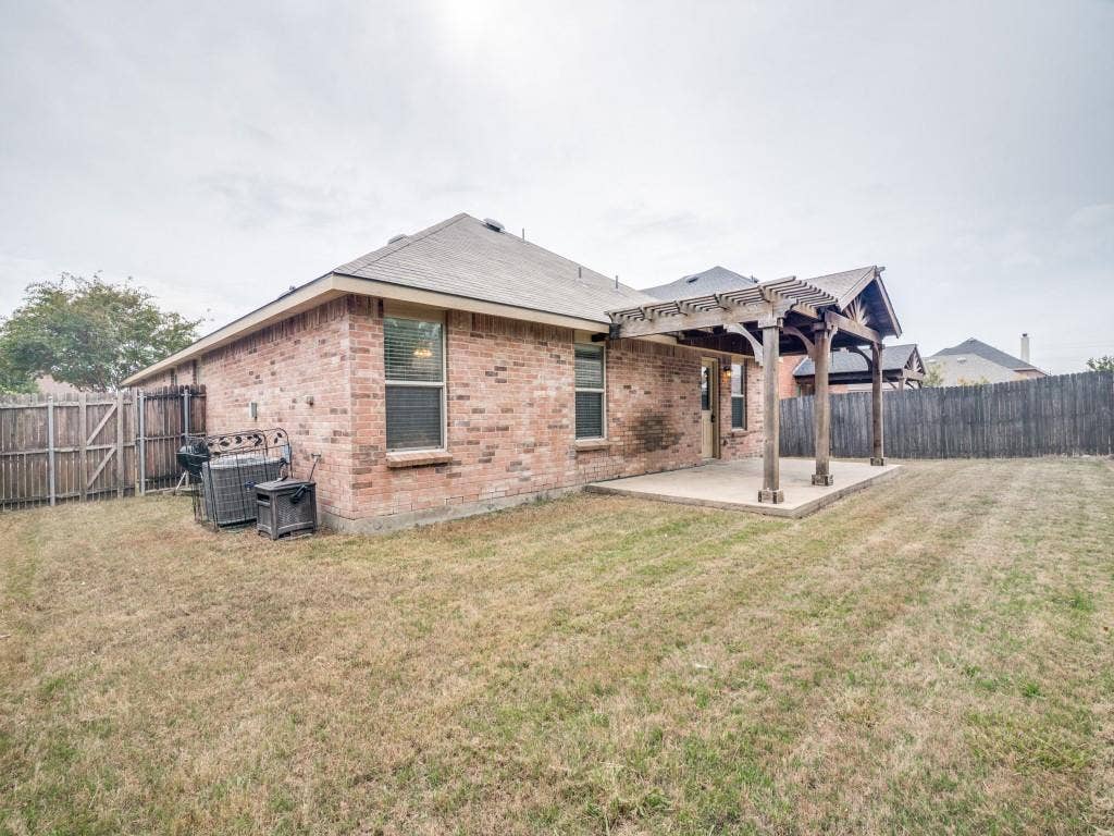 Fenced yard with room to relax, entertain, garden or play