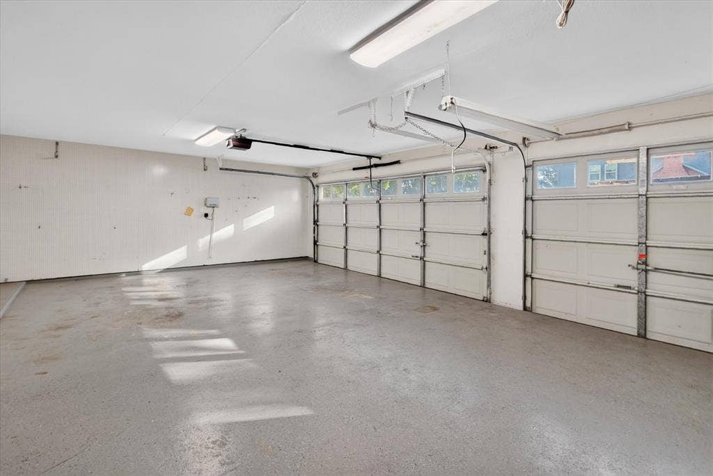 126 Allencrest Lane, Coppell, TX 75019 Huge three car garage with workbench