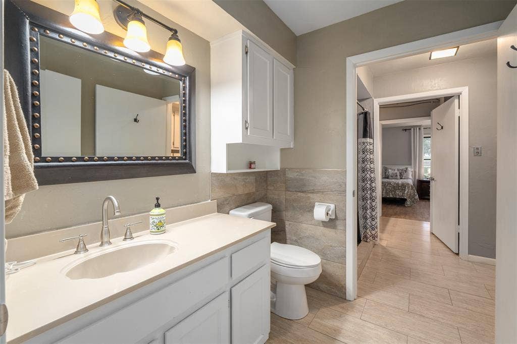 One Of Two Vanities-Toilet In Downstairs Bath