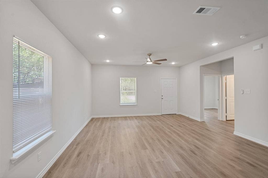 6144 Shawnee Drive, Mabank, TX 75156 Neutral-toned interior featuring wood-finish flooring, recessed lighting, and a ceiling fan