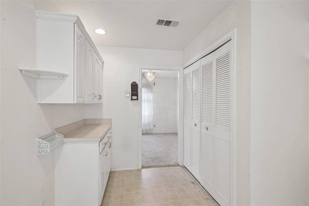 3309 S Edelweiss Drive, Grand Prairie, TX 75052 Built-in cabinets and counter space add extra storage.