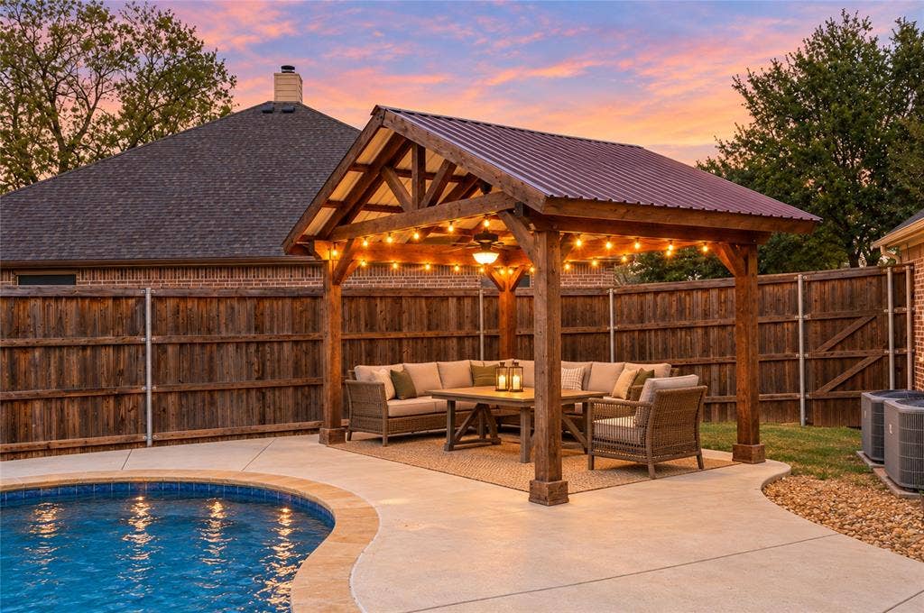 104 Aztec Court, Waxahachie, TX 75165 Relax at night under the lighted pergola by the pool! Virtually staged.