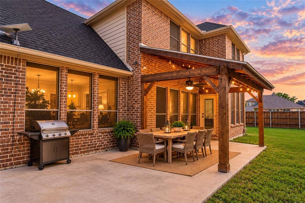 104 Aztec Court, Waxahachie, TX 75165 Covered patio has plenty of space for dining and grilling. Virtually staged.