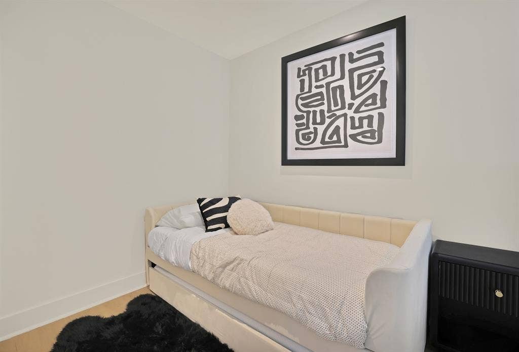 1731 N Fitzhugh Avenue, Dallas, TX 75204 Bedroom with wood-type flooring