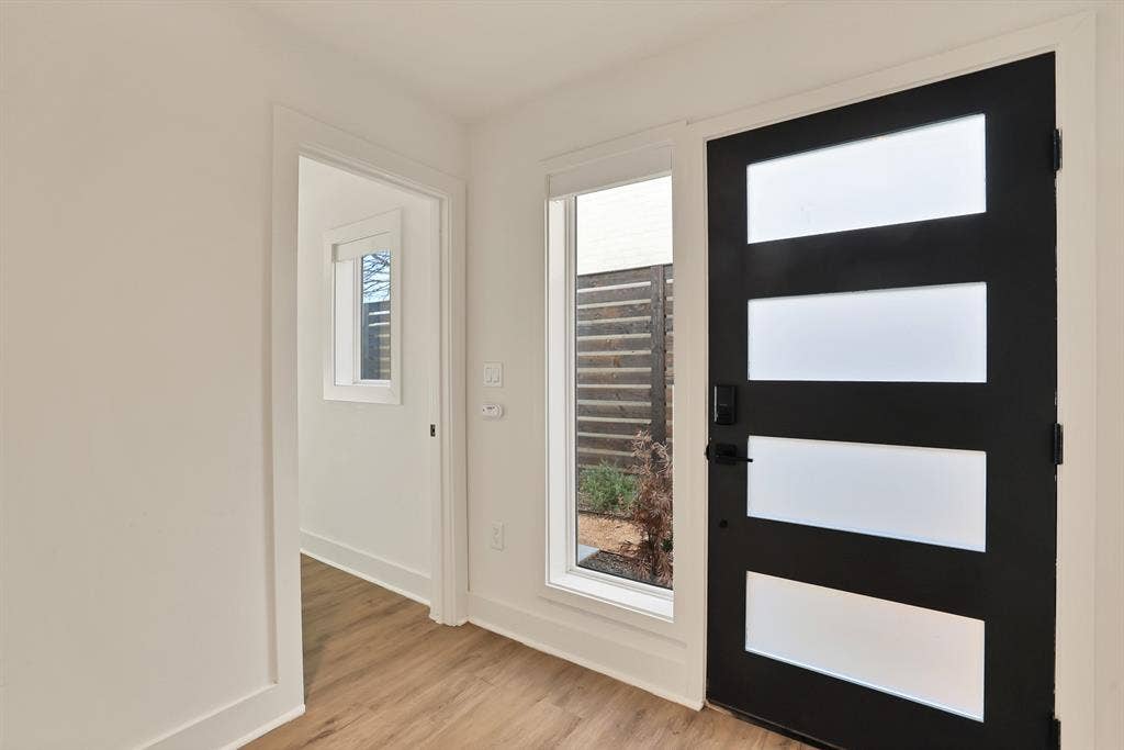 1731 N Fitzhugh Avenue, Dallas, TX 75204 Entryway with light hardwood / wood-style flooring