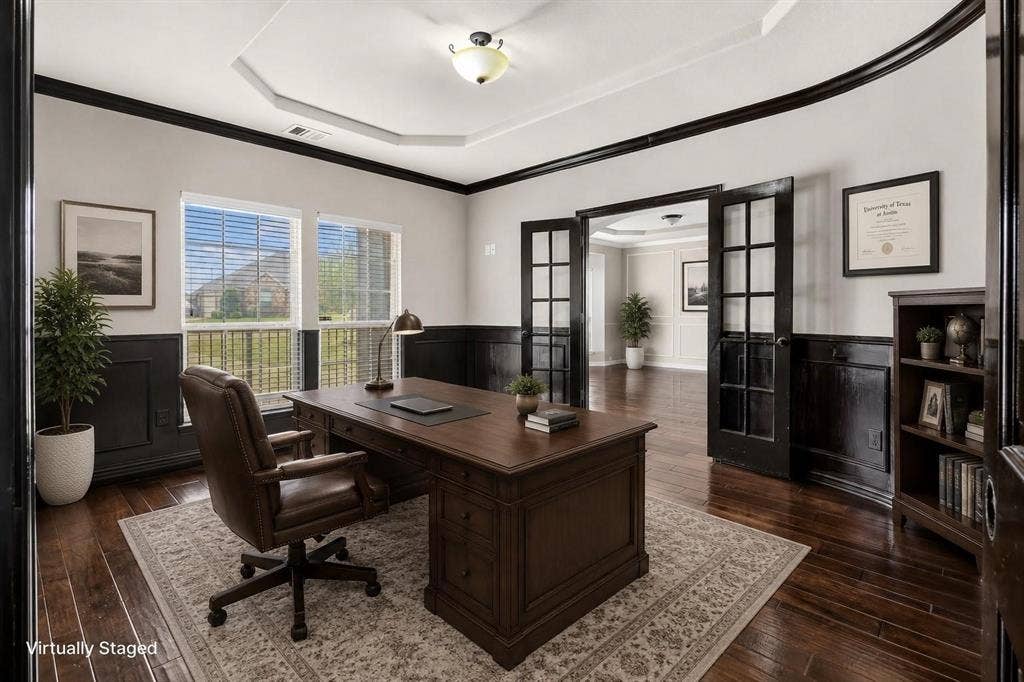 206 White Rock Court, Ovilla, TX 75154 Room featuring wood-finish flooring, tray ceiling, dark-tone wainscoting, and French doors with glass panes