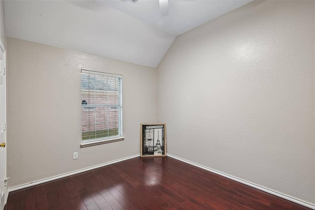 3837 Pine Valley Drive, Plano, TX 75025 Vaulted ceiling, wood-finish flooring, and a single-hung window