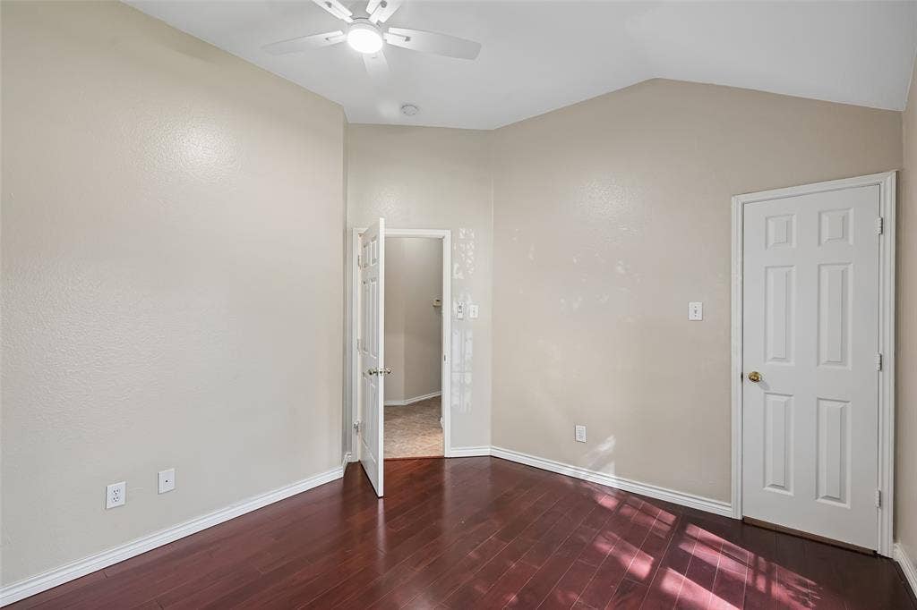3837 Pine Valley Drive, Plano, TX 75025 Vaulted ceilings, wood-finish flooring, and a central ceiling fan with integrated lighting