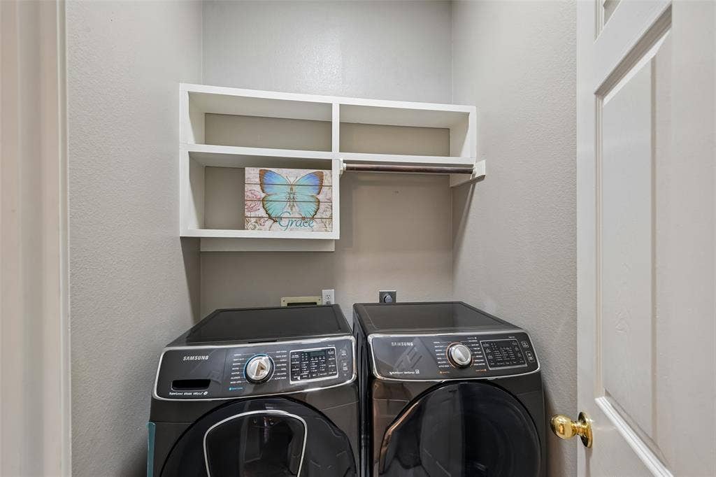 3837 Pine Valley Drive, Plano, TX 75025 Laundry area featuring white built-in shelving and a horizontal hanging rod