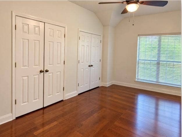 Bedroom #3 Hardwood flooring, vaulted ceiling, and a ceiling fan with integrated lighting.