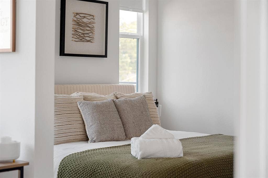 Neutral wall palette featuring a window with a roller shade