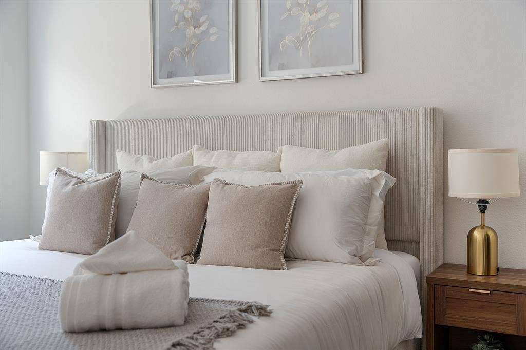 Textured, wingback-style upholstered headboard