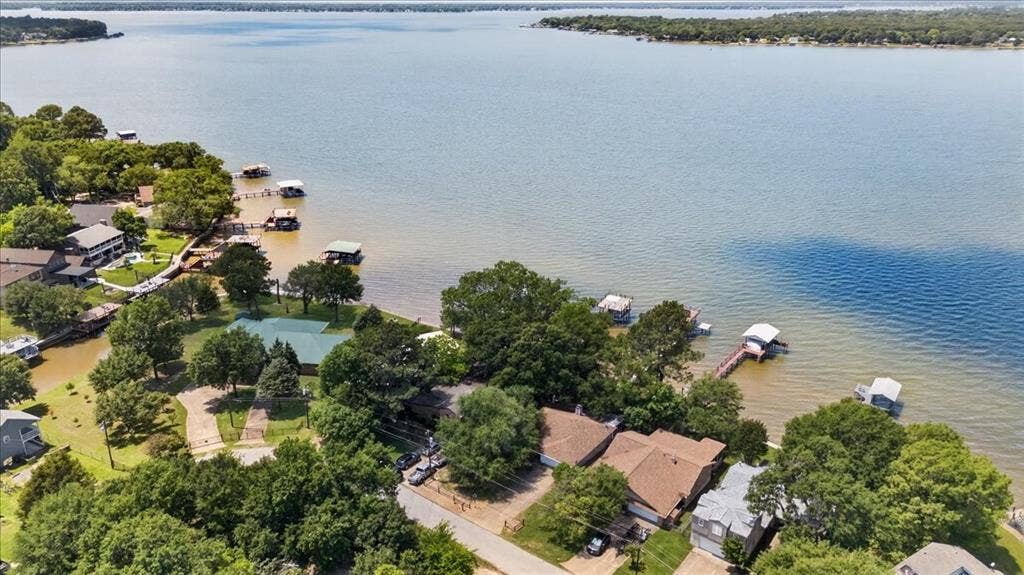 10118 Lakeview Street, Payne Springs, TX 75156 Waterfront lot featuring extensive shoreline, private boat dock, and mature trees