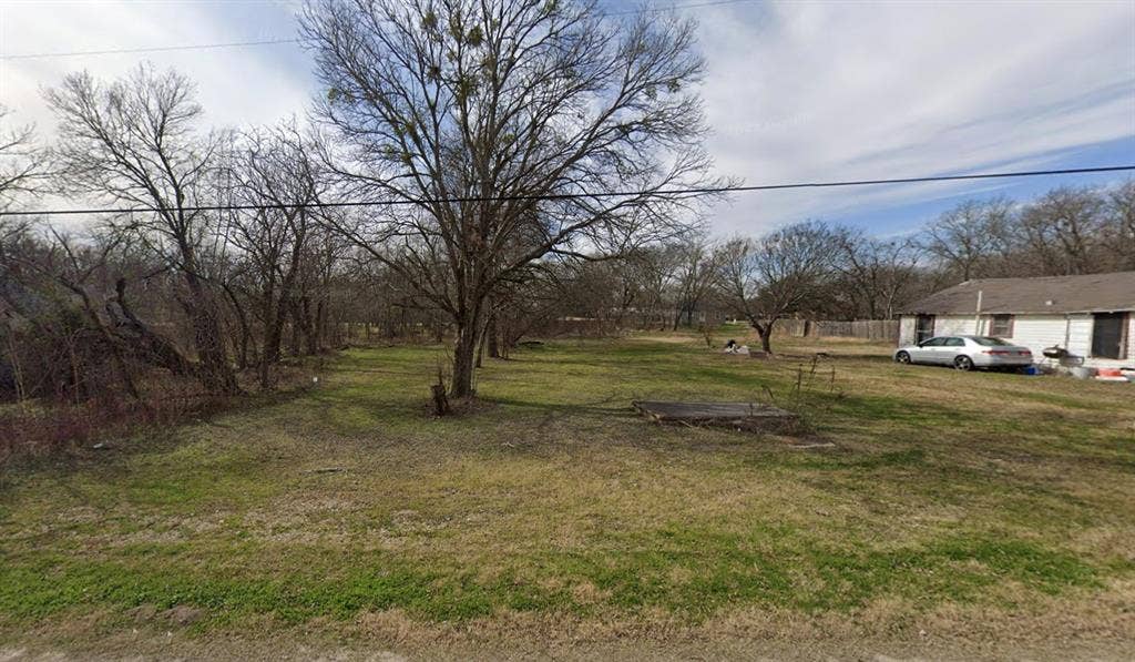 0 N Waco Street, Mart, TX 76664 Expansive lot featuring mature trees and established grass