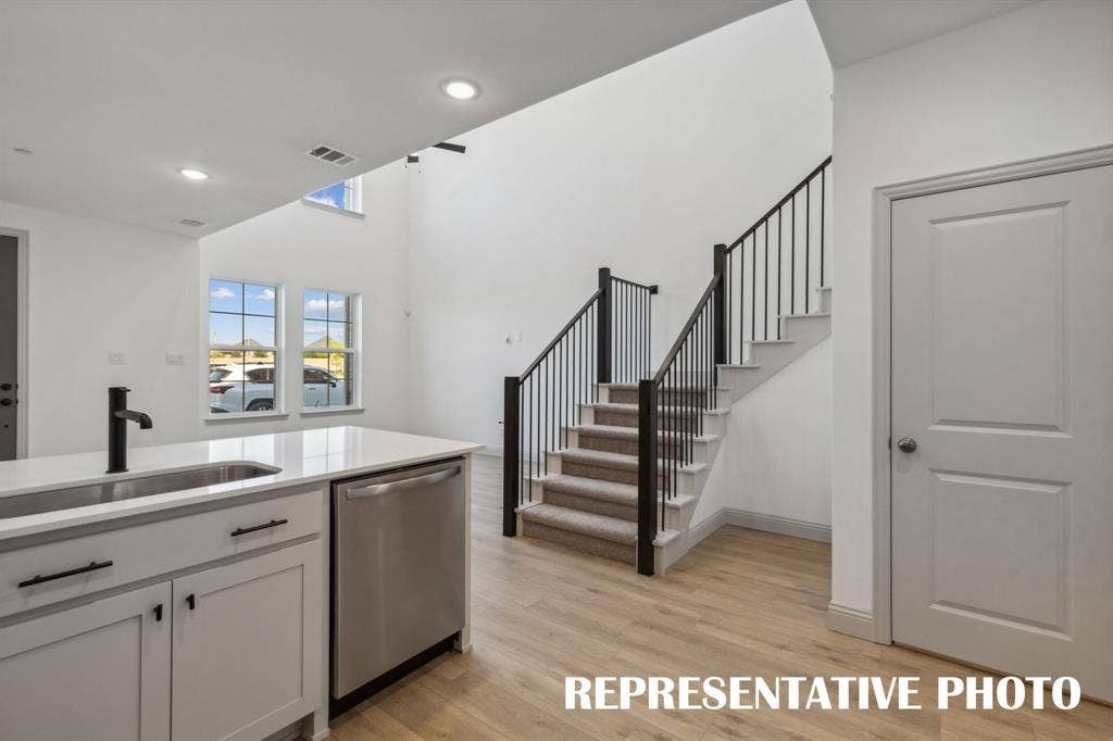 The chef will never be left out of the party in this open concept dream home!  REPRESENTATIVE PHOTO
