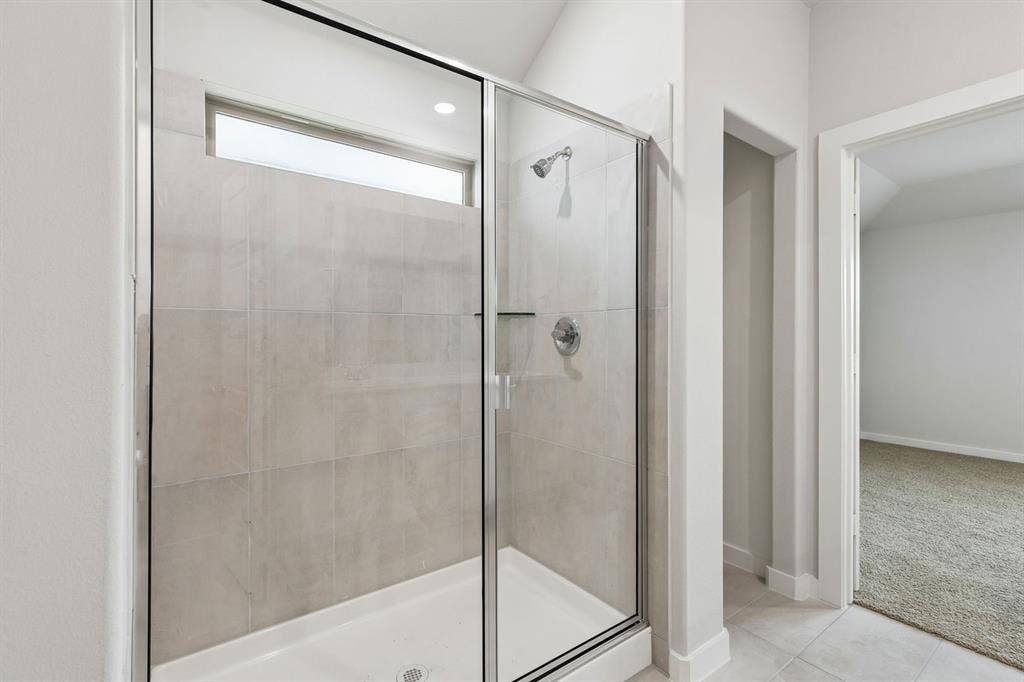 2219 Willowbank Drive, Forney, TX 75126 Primary Bathroom in the Oscar home plan – REPRESENTATIVE PHOTO