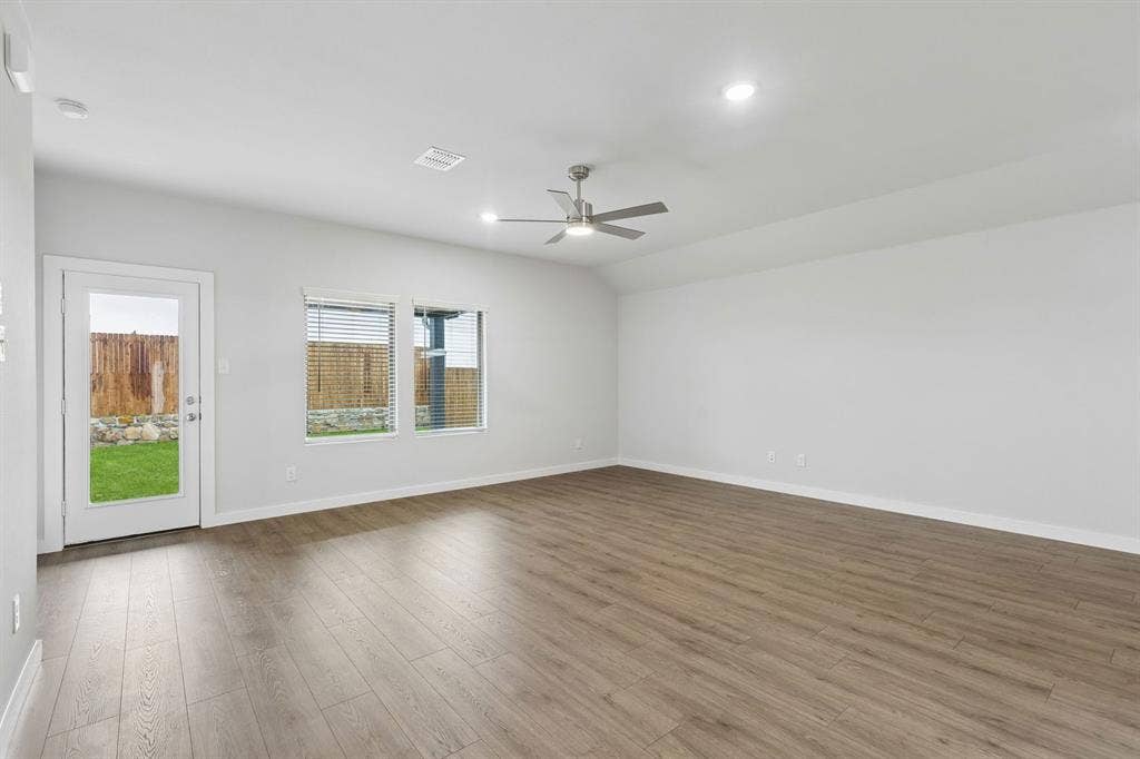 2219 Willowbank Drive, Forney, TX 75126 Living Room in the Oscar home plan – REPRESENTATIVE PHOTO