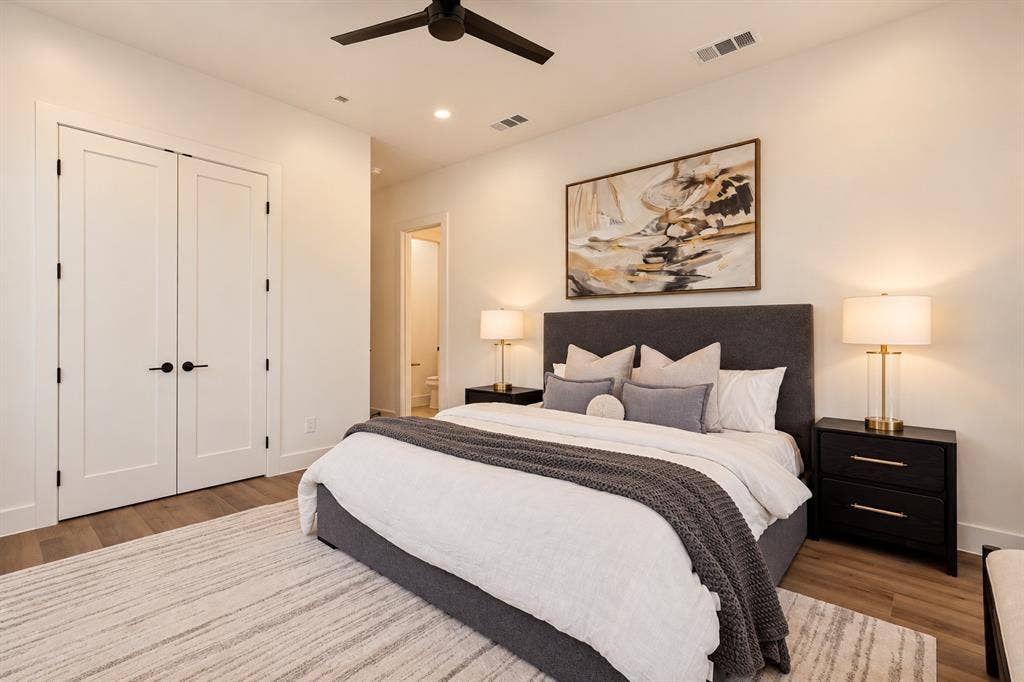 Recessed lighting, ceiling fan, wood-finish flooring, double panel doors, and neutral wall tones