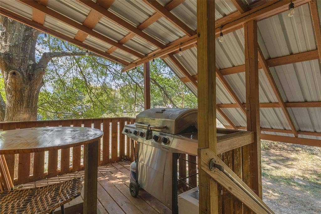131 Baff Bay Drive, Gun Barrel City, TX 75156 Covered deck with metal roof and space for a grill