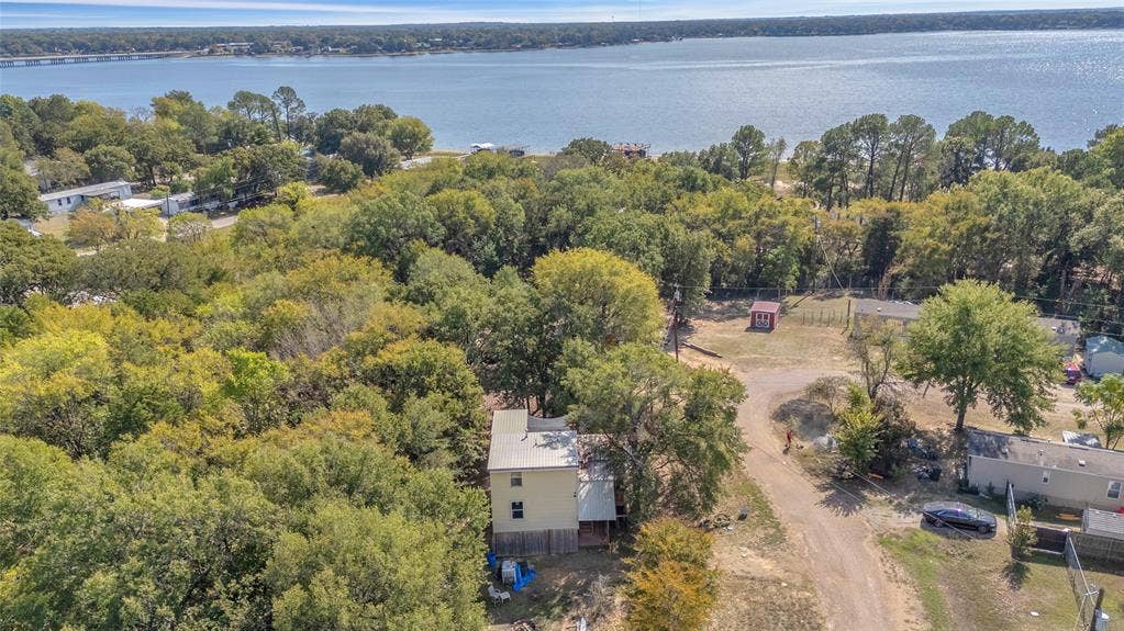 131 Baff Bay Drive, Gun Barrel City, TX 75156 Aerial view showing the home with Cedar Creek Lake just beyond