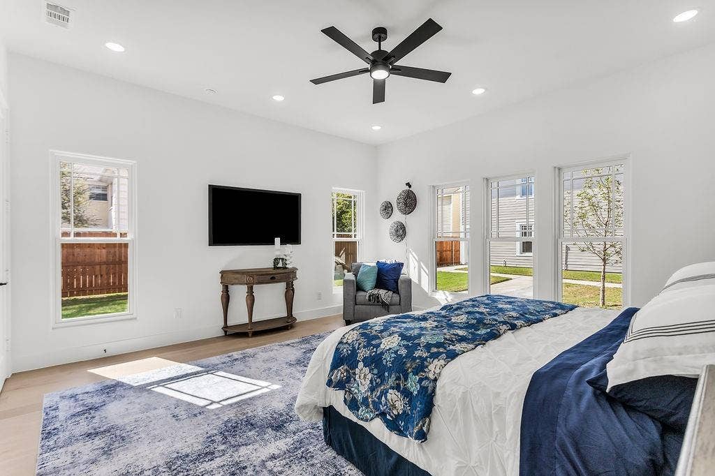 4631 Junius Street, Dallas, TX 75246 Spacious primary suite retreat with vaulted ceiling and designer finishes throughout