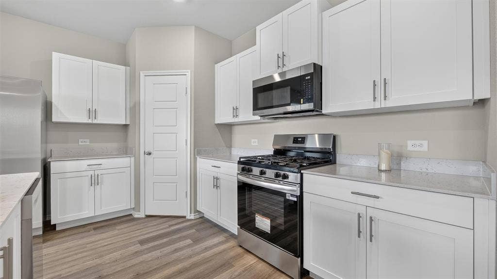 Kitchen - All Home and community information, including pricing, included features, terms, availability and amenities, are subject to change at any time without notice or obligation. All Drawings, pictures, photographs, video, square footages, floor plans, elevations, features, colors and sizes are approximate for illustration purposes only and will vary from the homes as built.