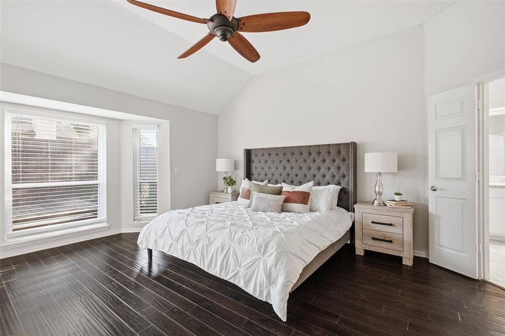 4010 Azure Lane, Addison, TX 75001 The bay window fills the primary bedroom with soft natural light, and there’s plenty of room to create your own sanctuary.