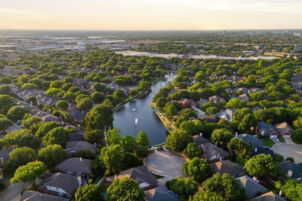 4010 Azure Lane, Addison, TX 75001 The neighborhood’s tree canopy surrounds the Les Lacs pond and its fountains. Scenic walks and peaceful views are just steps from home.