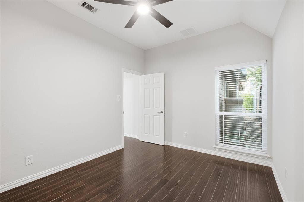 4010 Azure Lane, Addison, TX 75001 Natural light pours into the third bedroom. A perfect guest room, nursery or work-from-home space.