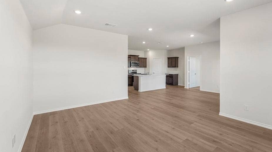 708 Rock Point Road, Josephine, TX 75135 Wood-finish flooring throughout, recessed lighting, and white walls