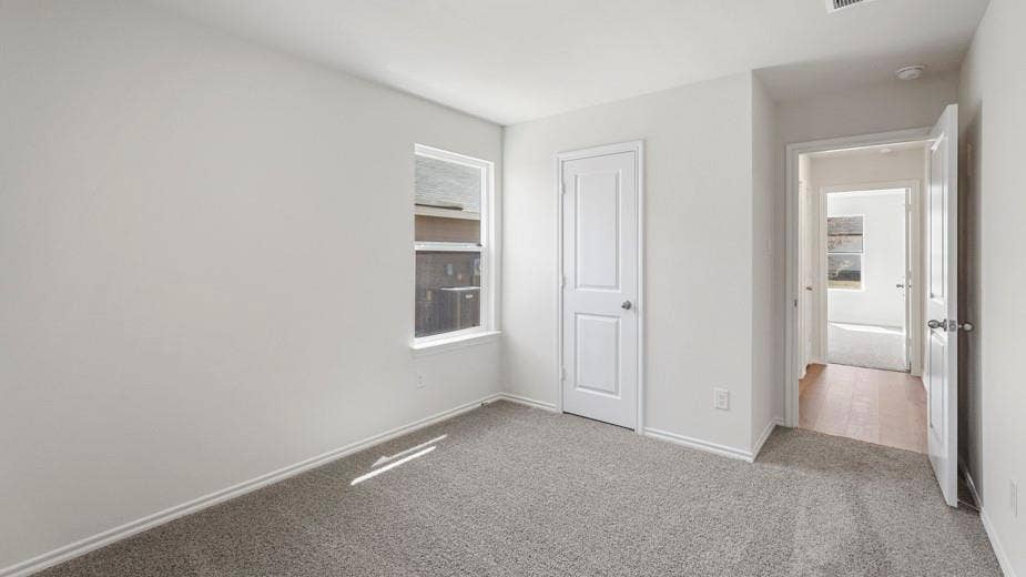 708 Rock Point Road, Josephine, TX 75135 Neutral wall color, carpeted flooring, white trim, and a single window
