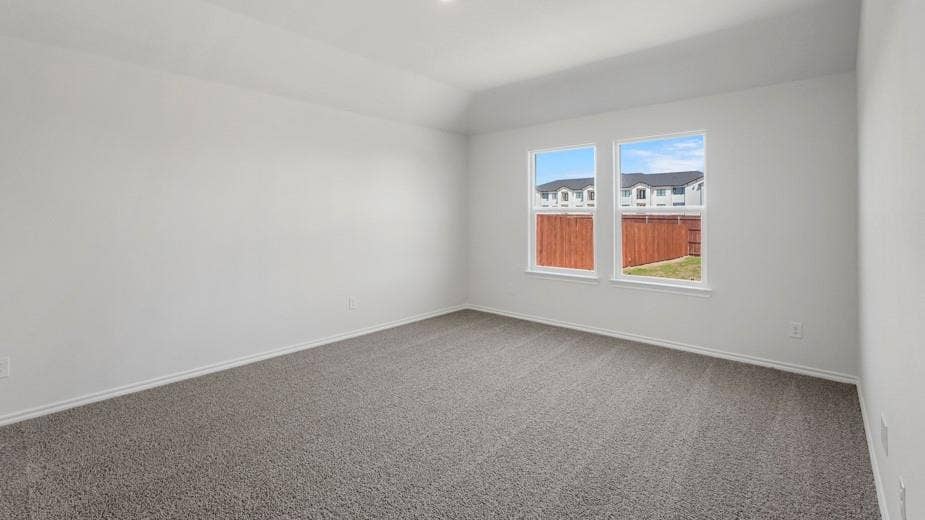 708 Rock Point Road, Josephine, TX 75135 Recessed ceiling light, vaulted ceiling, two windows, gray carpet flooring, white walls