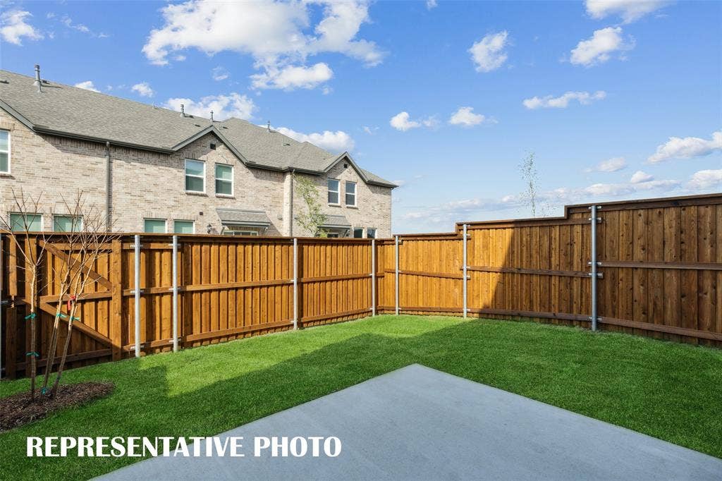 Our Baycliff plan features your own, fenced outdoor space!  REPRESENTATIVE PHOTO