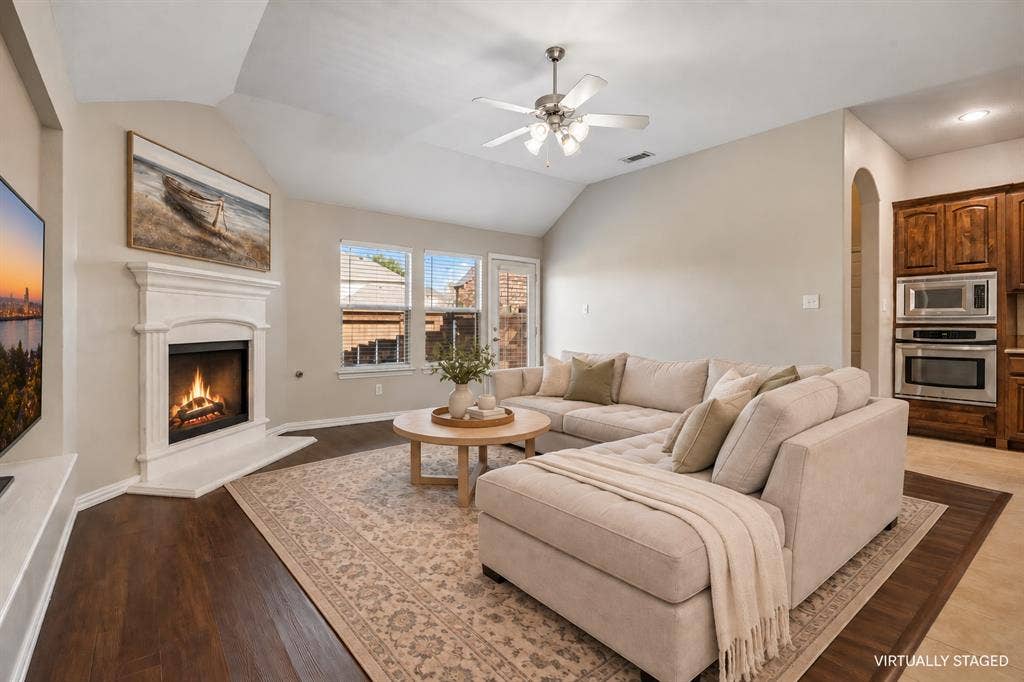 Cozy living room open to the kitchen and breakfast room.